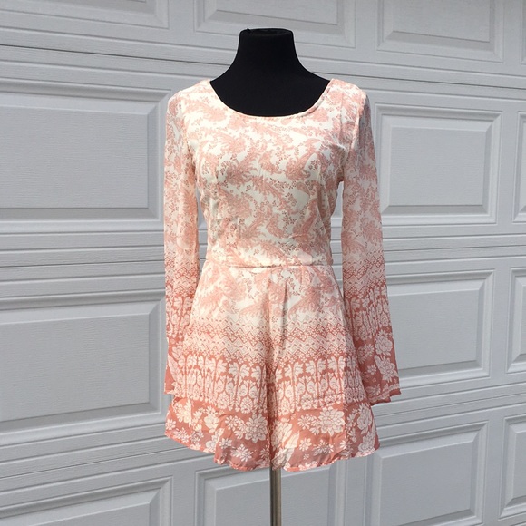 Other - Silky ornate fully lined romper with side pockets.